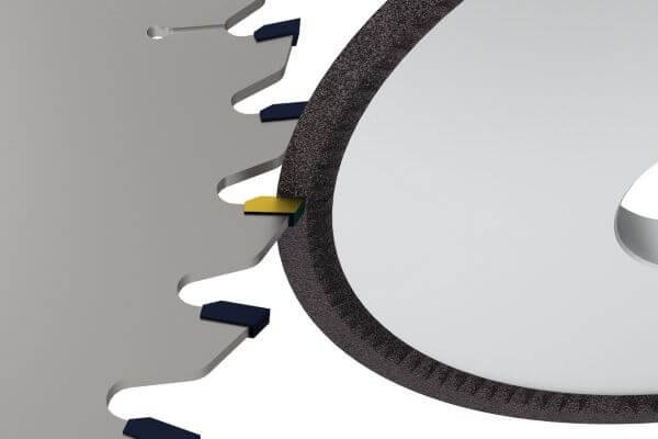 Face grinding operation on circular saw blade